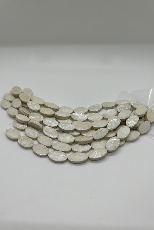 White Hammer Oyster Cracking Oval Bead Strand